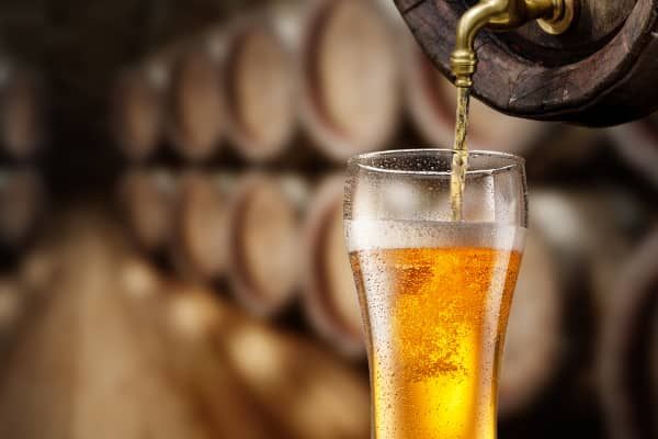 Glass of Beer poured from a Cask
